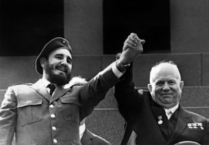 Cuban First Secretary of the Cuban Communist party and President of the State Council Fidel Castro (L) is shown in file photo dated May 1963 holding the hand of Soviet leader Nikita Khrushchev during a four-week offical visit to Moscow. / AFP PHOTO / TASS / -
