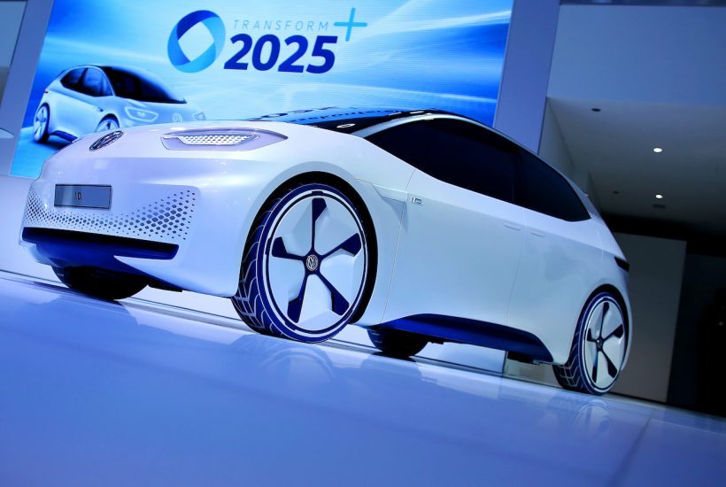 A Volkswagen AG I D concept electric automobile is displayed at a press conference on November 22, 2016 in Wolfsburg, northern Germany. Volkswagen on Tuesday said it wants to be the world leader in electric cars by 2025 as the German car giant unveiled a major shift to clean-energy vehicles in the wake of the dieselgate emissions cheating scandal. / AFP PHOTO / RONNY HARTMANN