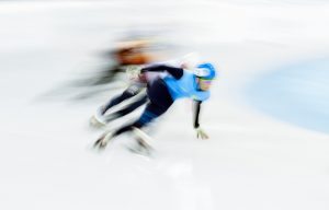Athletes compete in the men's 500m qualifying at the ISU World Cup Short Track speed skating event in Shanghai December 9, 2016. / AFP PHOTO / Johannes EISELE
