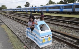Train workers block a train garage during a demonstration to mark International Women's Day, on the outskirts of Buenos Aires, on March 8, 2017. International Women's Day is marked worldwide with rallies and strikes. / AFP PHOTO / Juan MABROMATA