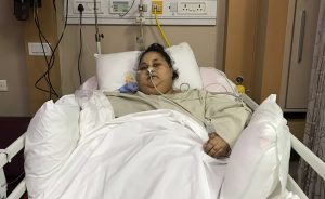 This handout photograph released by The Saifee Hospital on March 9, 2017, shows Egyptian patient Eman Ahmed Abd El Aty as she lies in a hospital bed at The Saifee Hospital in Mumbai on March 8, 2017, after an operation.   Indian doctors said March 9, 2017, that an Egyptian believed to be the world's heaviest woman had successfully undergone weight-loss surgery after losing over 100 kilogrammes (220 pounds).  Eman Ahmed Abd El Aty, who previously weighed around 500 kgs, had not left her house in Egypt in over two decades until arriving in Mumbai last month for bariatric surgery.   -------RESTRICTED TO EDITORIAL USE - MANDATORY CREDIT "AFP PHOTO / SAIFEE HOSPITAL" - NO MARKETING NO ADVERTISING CAMPAIGNS - DISTRIBUTED AS A SERVICE TO CLIENTS------  / AFP PHOTO / SAIFEE HOSPITAL / HO / RESTRICTED TO EDITORIAL USE - MANDATORY CREDIT "AFP PHOTO / SAIFEE HOSPITAL" - NO MARKETING NO ADVERTISING CAMPAIGNS - DISTRIBUTED AS A SERVICE TO CLIENTS
