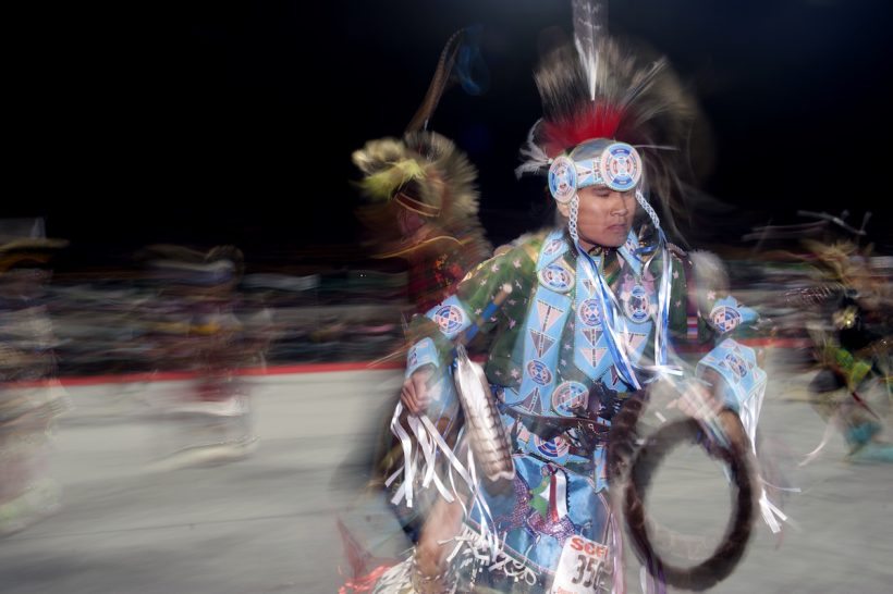 Native American dancers compete in the Men's Chicken Dance during the Denver March Powwow on March 24, 2017 in Denver, Colorado. Held over four days, the Denver March Powwow attracts an estimated 55,000 participants, made up of dancers, drummers, vendors, and spectators. Since 2009 roughly 95 nations, 35 US states, and five Canadian provinces have been represented during the powwow. / AFP PHOTO / Jason Connolly