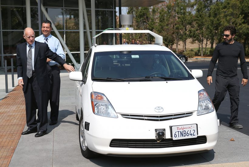 MOUNTAIN VIEW, CA - SEPTEMBER 25: (L-R) California Gov. Jerry Brown, California State Sen. Alex Padilla and Google co-founder Sergey Brin exit a self-driving car at the Google headquarters on September 25, 2012 in Mountain View, California. California Gov. Jerry Brown signed State Senate Bill 1298 that allows driverless cars to operate on public roads for testing purposes. The bill also calls for the Department of Motor Vehicles to adopt regulations that govern licensing, bonding, testing and operation of the driverless vehicles before January 2015. (Photo by Justin Sullivan/Getty Images)