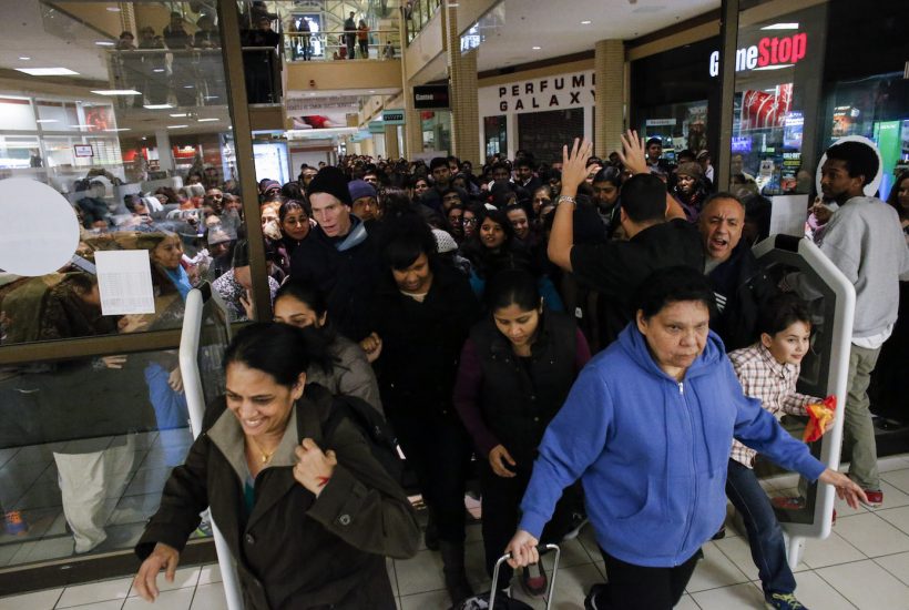 NEWPORT, NJ - NOVEMBER 27: People enter to JCpenny store on the Newport Mall on November 27, 2014 in Jersey City , New Jersey, United States. Black Friday sales, which now begin on the Thursday of Thanksgiving, continue to draw shoppers out for deals and sales. (Photo by Kena Betancur/Getty Images)