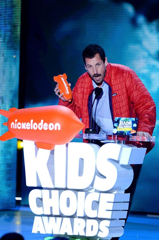 INGLEWOOD, CA - MARCH 12: Actor Adam Sandler accepts the Favorite Animated Movie award for 'Hotel Transylvania 2' onstage during Nickelodeon's 2016 Kids' Choice Awards at The Forum on March 12, 2016 in Inglewood, California. (Photo by Kevin Winter/Getty Images)