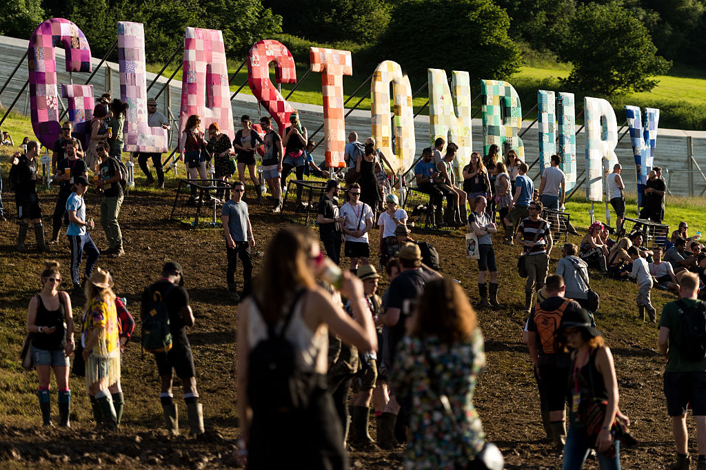 GLASTONBURY, ENGLAND - JUNE 22: A general view of festival goers in the sunshine at the Glastonbury Festival at Worthy Farm, Pilton on June 22, 2016 in Glastonbury, England. Now its 46th year the festival is one largest music festivals in the world and this year features headline acts Muse, Adele and Coldplay. The Festival, which Michael Eavis started in 1970 when several hundred hippies paid just £1, now attracts more than 175,000 people. (Photo by Ian Gavan/Getty Images)