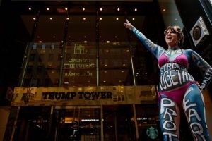 NEW YORK, NY - NOVEMBER 14: Gigi Love protests in support of the environment in front of Trump Tower, November 14, 2016 in New York City. Trump is in the process of choosing his presidential cabinet as he transitions from a candidate to the president-elect. (Photo by Drew Angerer/Getty Images)