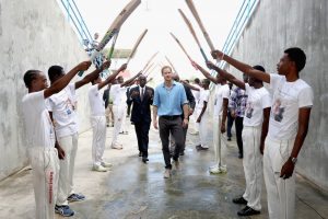 ST JOHNS, ANTIGUA - NOVEMBER 21: Prince Harry is saluted by young cricket players as he attends a youth sports festival at Sir Vivian Richards Stadium showcasing Antigua and Barbuda's national sports, on the second day of an official visit to the Caribbean on November 21, 2016 in Antigua, Antigua and Barbuda. Prince Harry's visit to The Caribbean marks the 35th Anniversary of Independence in Antigua and Barbuda and the 50th Anniversary of Independence in Barbados and Guyana. (Photo by Chris Jackson/Getty Images)