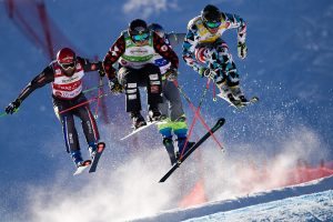 VAL THORENS, FRANCE - DECEMBER 10: Brady Leman of Canada takes 2nd place, Jonas Devouassoux of France competes, Thomas Zangerl of Austria competes during the FIS Freestyle Ski World Cup Men's and Women's Ski Cross on December 10, 2016 in Val Thorens, France. (Photo by Laurent Salino/Agence Zoom/Getty Images)