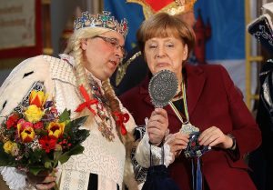 BERLIN, GERMANY - JANUARY 23: German Chancellor Angela Merkel meets a Carnival delegation during the annual Carnival reception at the Chancellery on January 23, 2017 in Berlin, Germany. Carnival will soon begin across southwestern Germany and the season culminates in Rose Monday parades and festivities on February 27. (Photo by Sean Gallup/Getty Images)
