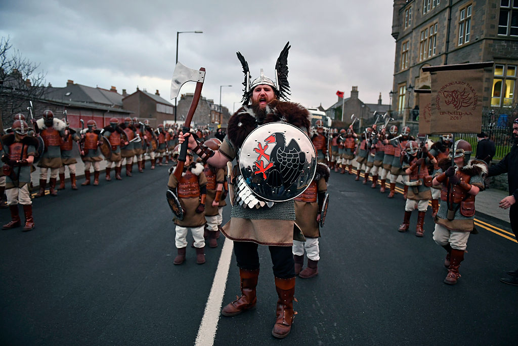 LERWICK, SCOTLAND - JANUARY 31: The Guizer Jarl, Lyle Gairmand his Jarl Squad march through the streets of Lerwick on January 31, 2017, in the Shetland Islands, Scotland. The traditional festival of fire is known as 'Up Helly Aa'. The spectacular event takes place annually on the last Tuesday of January. The climax of the day comes with participants in full costume hauling a Viking longboat through the streets of Lerwick to the edge of town where up to 1000 people parade and throw their flaming torches into the galley. (Photo by Jeff J Mitchell/Getty Images)