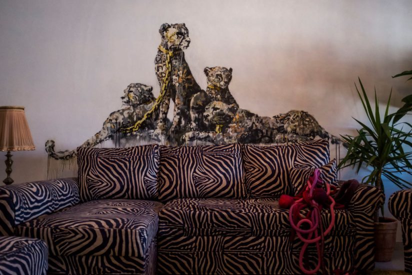 BETHLEHEM, WEST BANK - MARCH 04: A general view inside street artist Banksy's newly opened Walled Off Hotel in the Israeli occupied West Bank town of Bethlehem on March 4, 2017 in Bethlehem, West Bank. Anonymous British street artist Banksy launched a hotel in occupied West Bank and next to Israels controversial separation wall in Bethlehem yesterday. The rooms of the hotel are also filled with the artist's work, much of which being about the conflict. The owners say it will be a functioning hotel along with being part art gallery and part political statement. (Photo by Ilia Yefimovich/Getty Images)