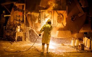 SALZGITTER, GERMANY - MARCH 07: A workercleans a big melting pot at the Salzgitter AG steelworks on March 7, 2017 in Salzgitter, Germany. Salzgitter is among Europe's biggest steel producers and is scheduled to announce its financial results for 2016 on March 24. (Photo by Morris MacMatzen/Getty Images)