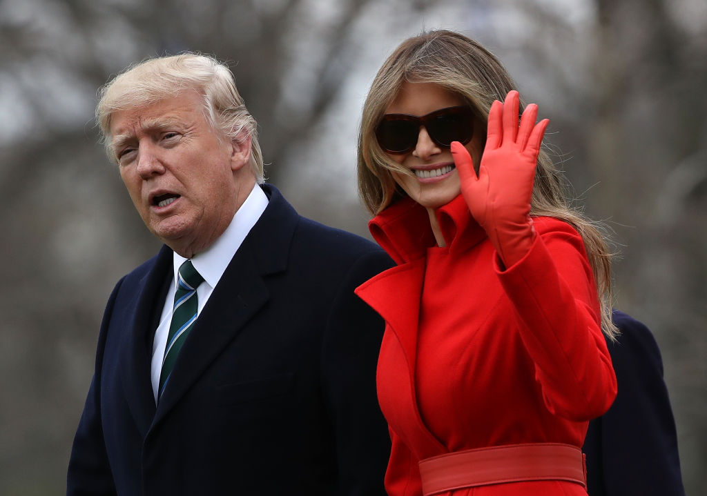 WASHINGTON, DC - MARCH 17: U.S. President Donald Trump (L) and First Lady Melania Trump (R) prepare to depart the White House on March 17, 2017 in Washington, DC. President Trump is spending the weekend at his Mar-a-Lago estate in Florida. (Photo by Justin Sullivan/Getty Images)