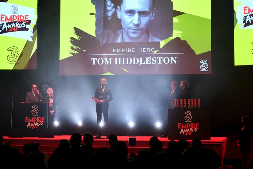 LONDON, ENGLAND - MARCH 19: Tom Hiddleston wins the Empire Hero award during the THREE Empire awards at The Roundhouse on March 19, 2017 in London, England. (Photo by Ian Gavan/Getty Images)