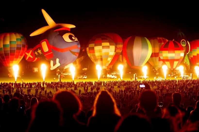 HAMILTON, NEW ZEALAND - MARCH 25: The balloons inflate for the Zuru Night Glow at Balloons Over Waikato on March 25, 2017 in Hamilton, New Zealand. (Photo by Phil Walter/Getty Images for Balloons Over Waikato Trust)