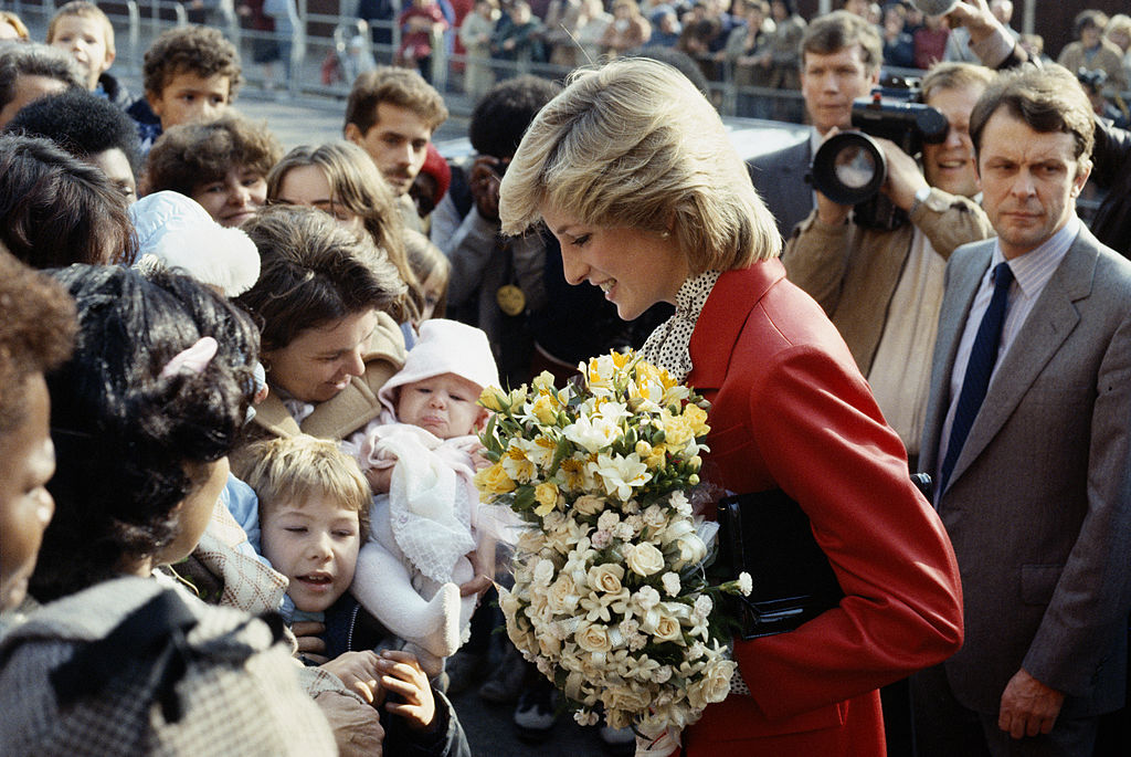 Princess Diana wearing a Jasper Conran suit during a visit to a community centre in Brixton, October 1983. (Photo by Princess Diana Archive/Getty Images)